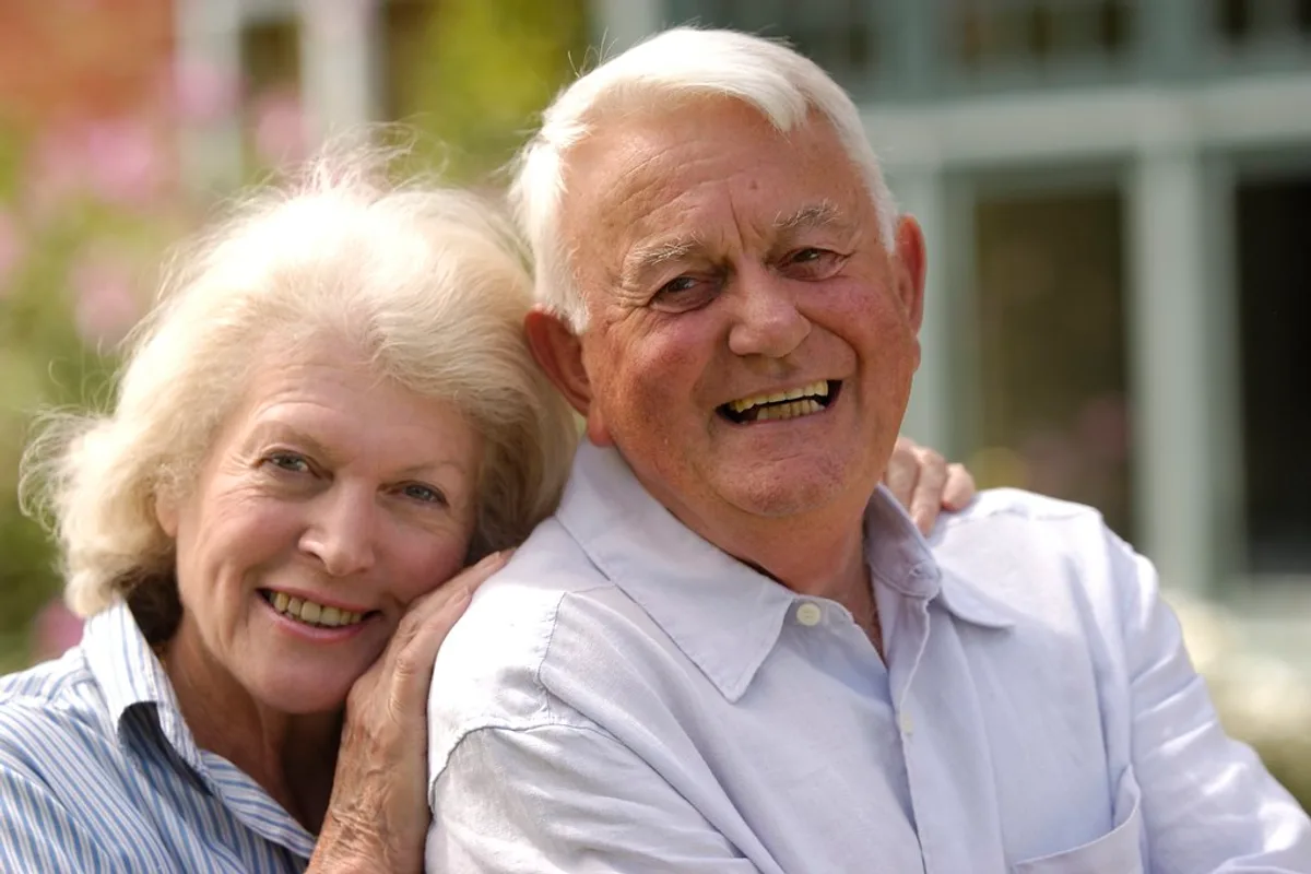 Senior couple sharing an easy, relaxed conversation together